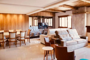 GramadoSuites 4quartos ambientesClimatizados Lareira Churrasqueira